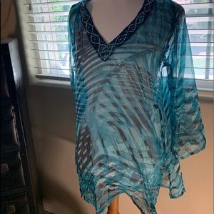 Blue medium size bathing suit cover up.